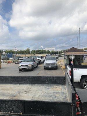 10 trucks waiting in line to get loaded.