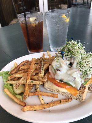 Veggie Delight sandwich, iced tea and water.