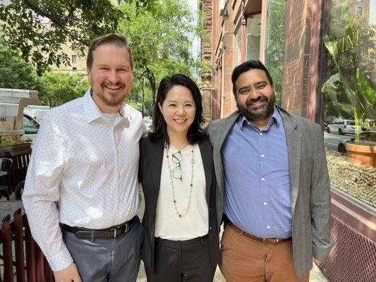 My husband and I with Young after the successful completion of his N-400 citizenship interview.