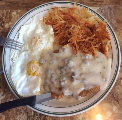 Cheers On 1st. Chicken Fried Steak, two eggs (over easy), hash browns and homemade gravy.