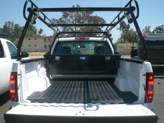 2012 Chevy Silverado W/ RackIt Truck Rack, Rack-Straps, UWS Black Aluminum low profile deep tool box and rubber bed mat.