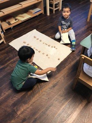 Collaborative Montessori work.