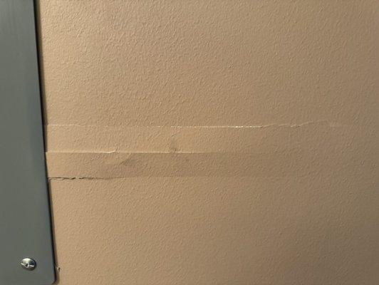 Two cracks they made while installing electrical panel