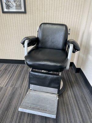 A barber chair in the lounge?