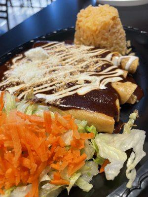 Mole Flautas with rice and salad. Under $8