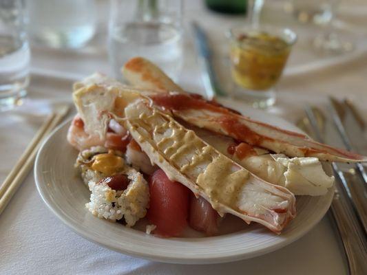 King crab, chilled lobster, sushi, and baby octopus and conch cocktail.