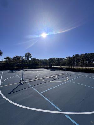 pickleball net on the basketball court