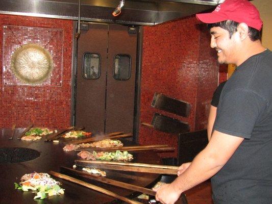 Each persons meal is kept separate while cooking.