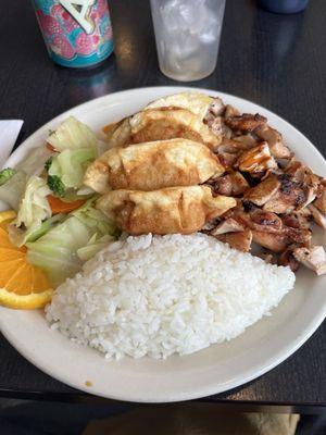 Lunch special with teriyaki chicken and gyoza.