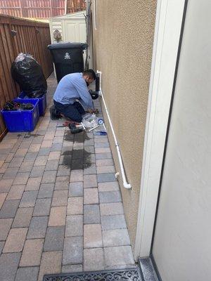 Daniel installing drainage plumbing to my sewage connection.