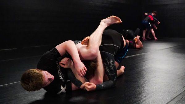 Student using the triangle at Standard Jiujitsu