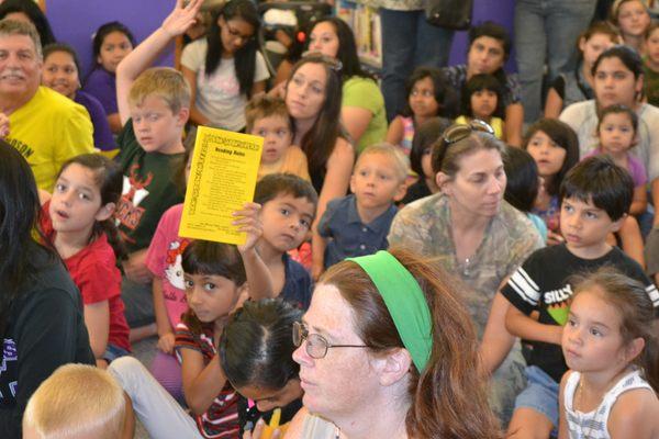 Guests at a puppet show.