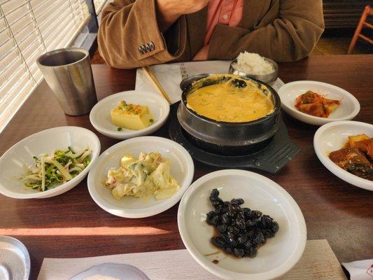 Banchan and soybean puree with pork and kimchee.