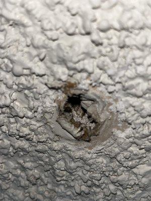 Hole THREE in bedroom ceiling