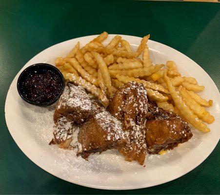 Monte Cristo sandwich! Turkey, ham, American and Swiss! Breaded and deep fried with a dust of powdered sugar and raspberry jam! Yum!