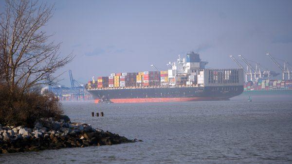 Boats cross under the I-695 Bridge and heads into Baltimore Harbor/Port of Baltimore to be loaded/unloaded.