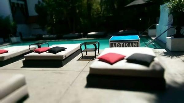 Looking out at the pool from our free cabana.