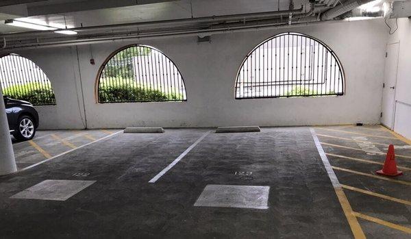 Handicap parking spaces painted over