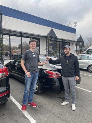 My son and his first car with our amazing salesperson, Armando!  Great experience!