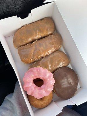 Maple bars, strawberry cruller, chocolate custard filled, and old fashioned