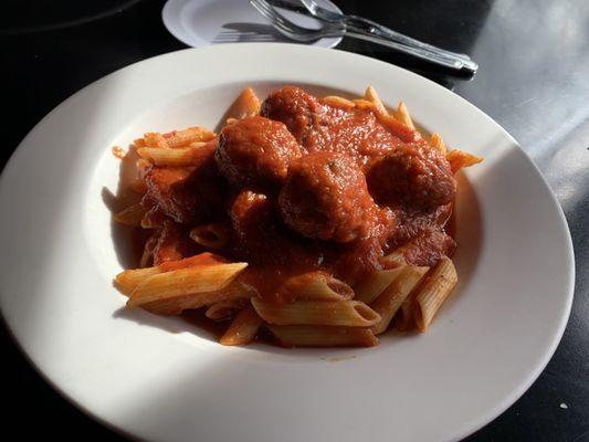 Penne with meatballs.