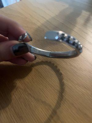 Bracelet breaking, with tarnishing.