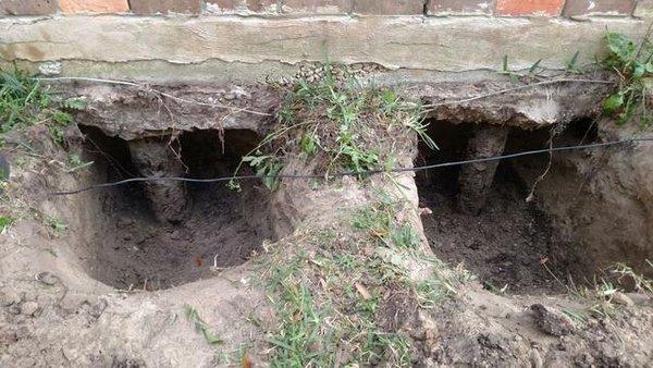 slab house with rotted wood pilings