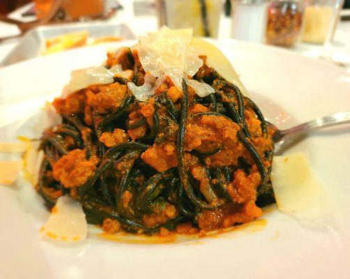 Bolognese with black spaghetti. So delicious! I highly recommend this dish!