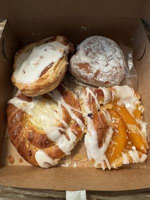 Cheese danish, peach danish, powdered jelly n some French pastry. I ate the powdered cream donut already.