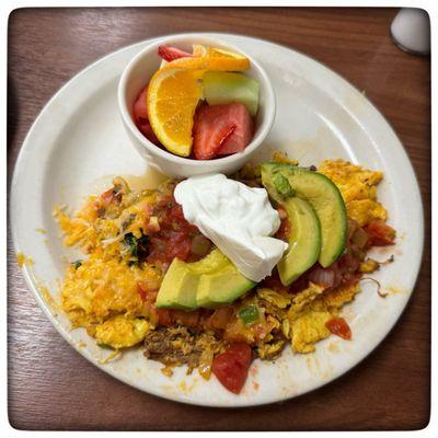 Manchaca Scramble with a side of fruit.