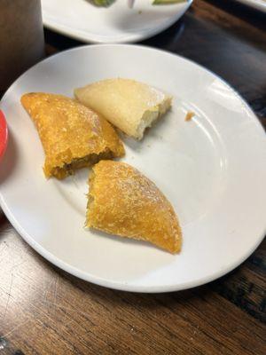 Beef and Queso empanadas. Each was approximately 2 bites each.