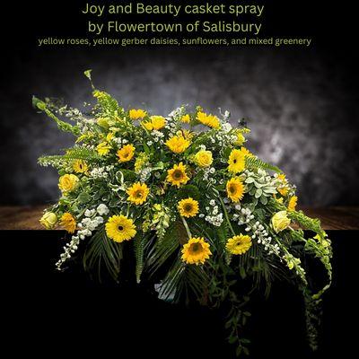 Joy and Beauty Casket Spray with fresh Sunflower and Gerber Daisies