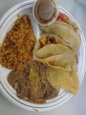 Roasted Chicken Tacos w/ rice & beans $5.99