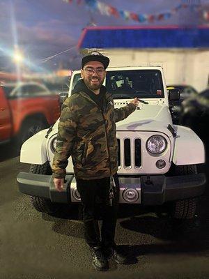 BEYOND excited; happy; pleased. Standing with my new JEEP WRANGLER SAHARAH UNLIMITED.