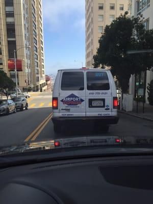 Picture of the vehicle/driver who was yelling profanities and honking at cars yielding to pedestrians. Awful awful awful.