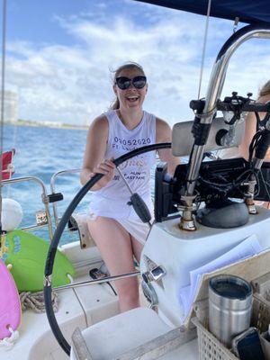 The bride steering the boat!