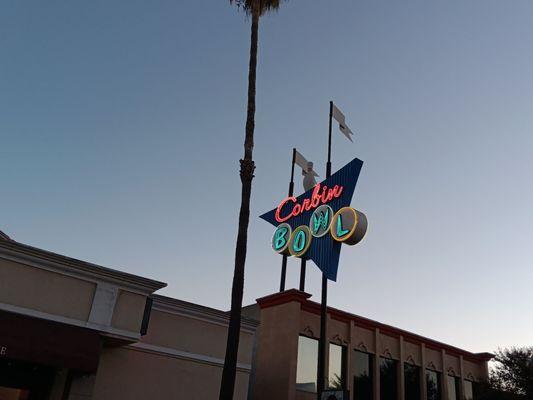 Neon sign at dusk