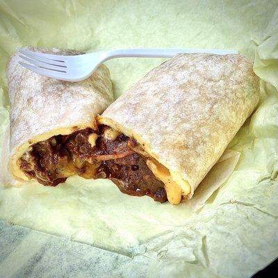 Breakfast burrito w/sausage,bacon, eggs, crispy hash-browns, yellow chiles, & CHILI! So good.