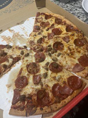 Thin, 3topping xl, beef ham and pepperoni. Skimped on toppings for the price. Edges are burnt and inedible. Did not like this pizza.