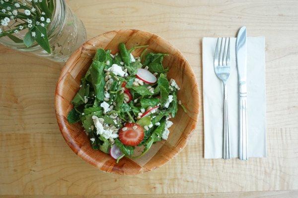 Kale, farro, radish, strawberries, goat cheese, sunflower seeds.