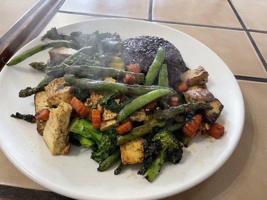 Vegan tofu vegetable special with black rice.