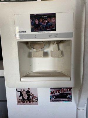 Auto elite stickers on my fridge so everyone who comes over knows where to get there registration services;)