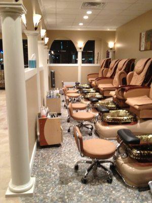 Many pedicure massage chairs.