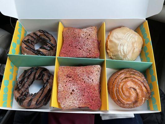 From left - champurrado cruellers, berry french toast, banana chai cold brew (top right), blood orange poppyseed fritter.