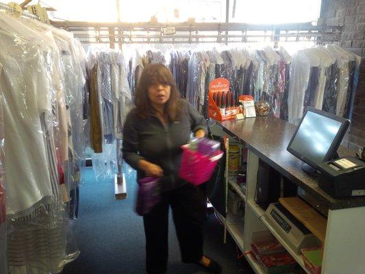 Owner Elvira hard at work, Sam's Cleaners, Placentia, CA