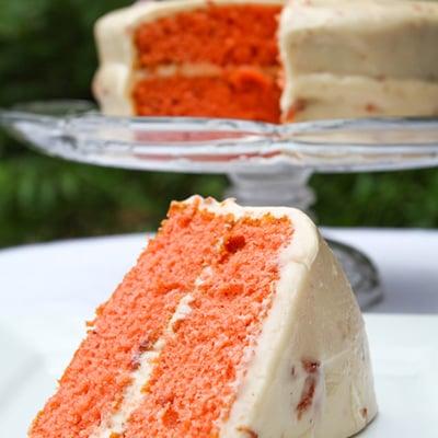 A customer favorite, we take two moist Strawberry Cake layers and surround them with our Cream Cheese Frosting.   Two 8″ layers. Serves up t