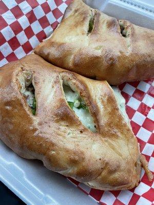 Calzone with onions, peppers, and sausage