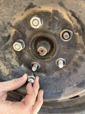 Where the wrong lug was and also broken wheel stud