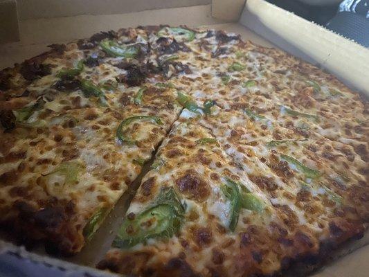 Half philly cheese whole green bell peppers extra cheese on thin crust pie cut