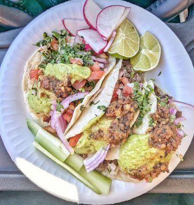 Asada, cabeza, and chicken tacos on freshly made tortillas